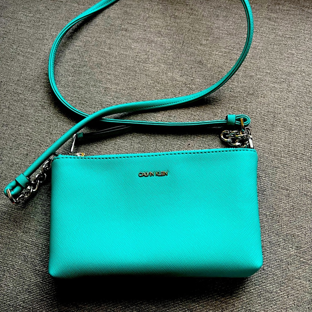 NWOT Calvin Klein turquoise cross body purse